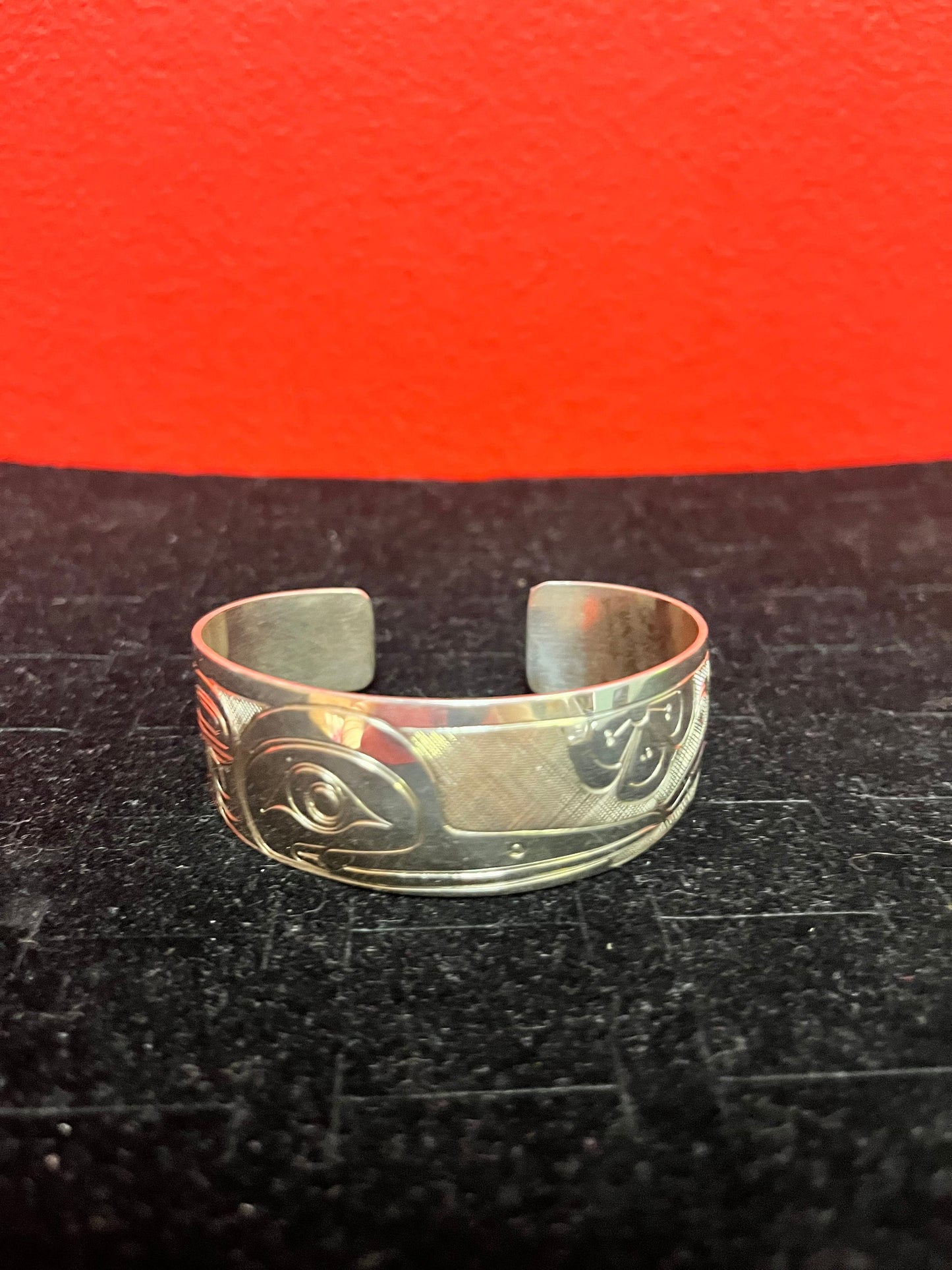 A  Stunning 2 1/2 inch wide by 1 inch high  signed Tony Hunt Sterling silver Thunderbird bracelet  indigenous first nations northwest coast