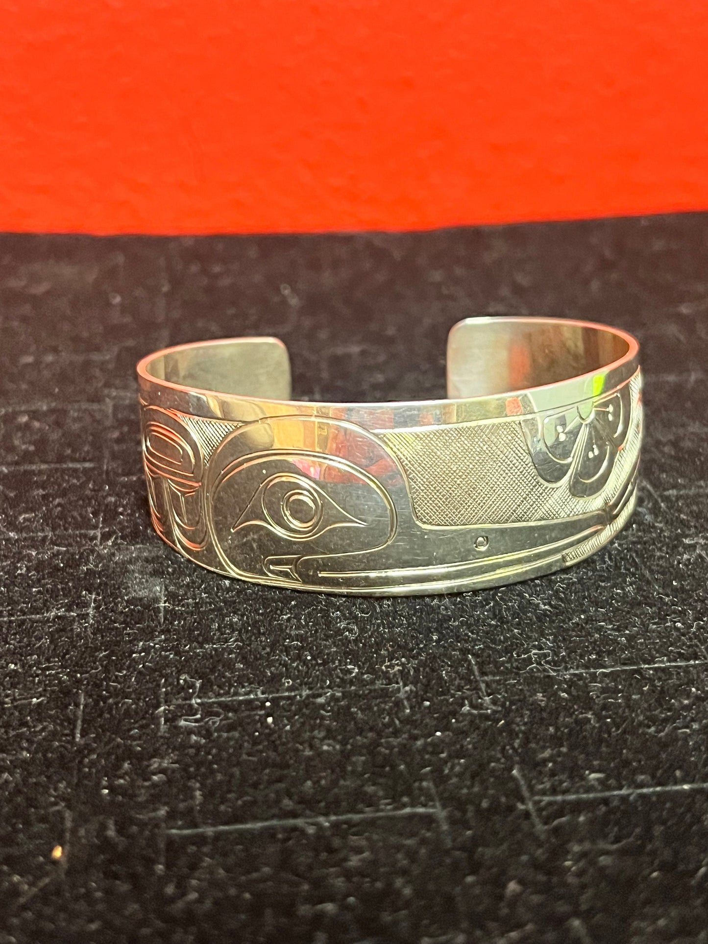 A  Stunning 2 1/2 inch wide by 1 inch high  signed Tony Hunt Sterling silver Thunderbird bracelet  indigenous first nations northwest coast