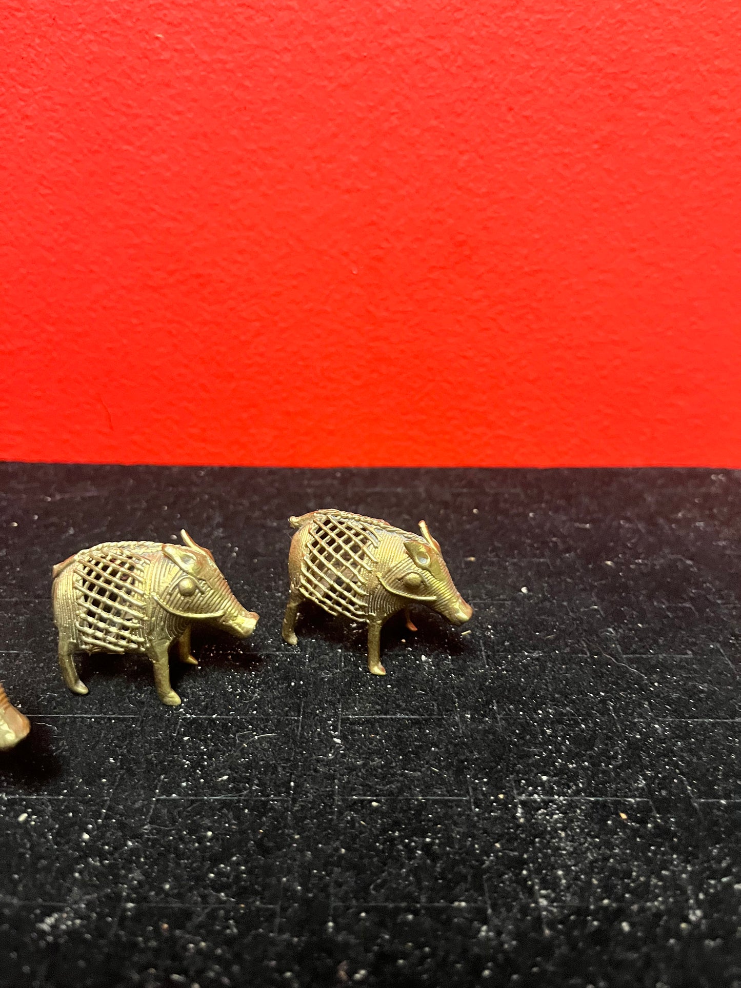 Lovely set of three African Benin brass boars  older  1.5 to 2 inches long each