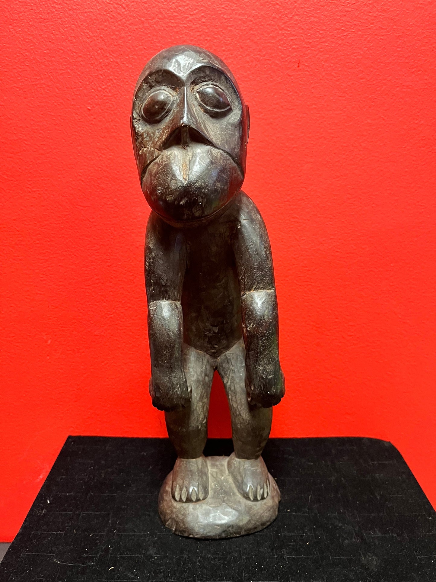 A  Stunning Unusual African statue of a monkey man - antique with wonderful patina in great condition - 14 inches tall