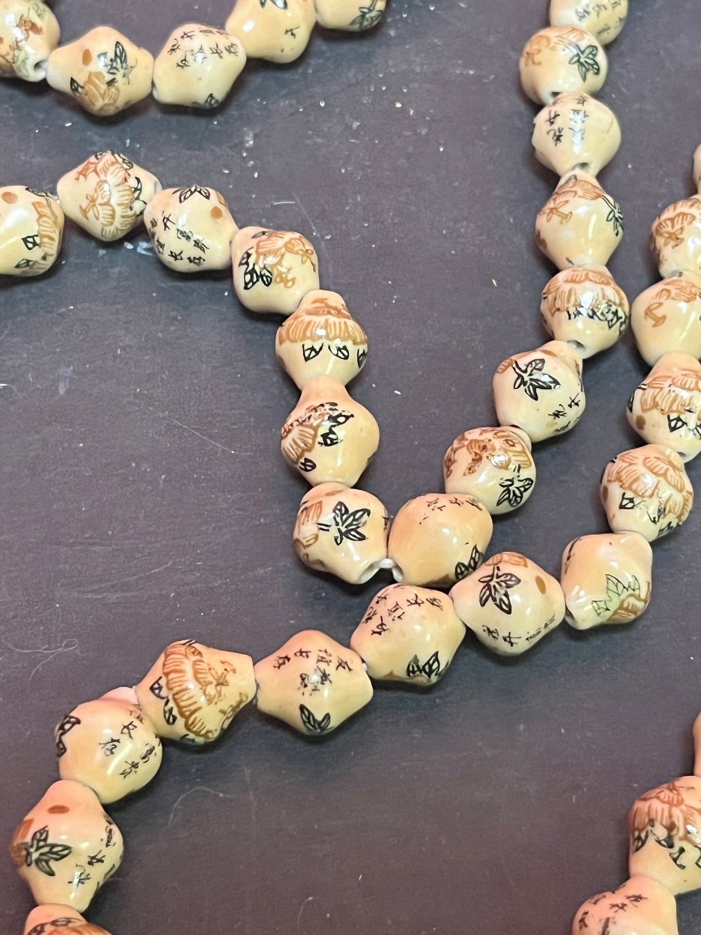 A  Stunning antique Chinese individually, signed pottery bead necklace  approximately 52 inches long - amazing