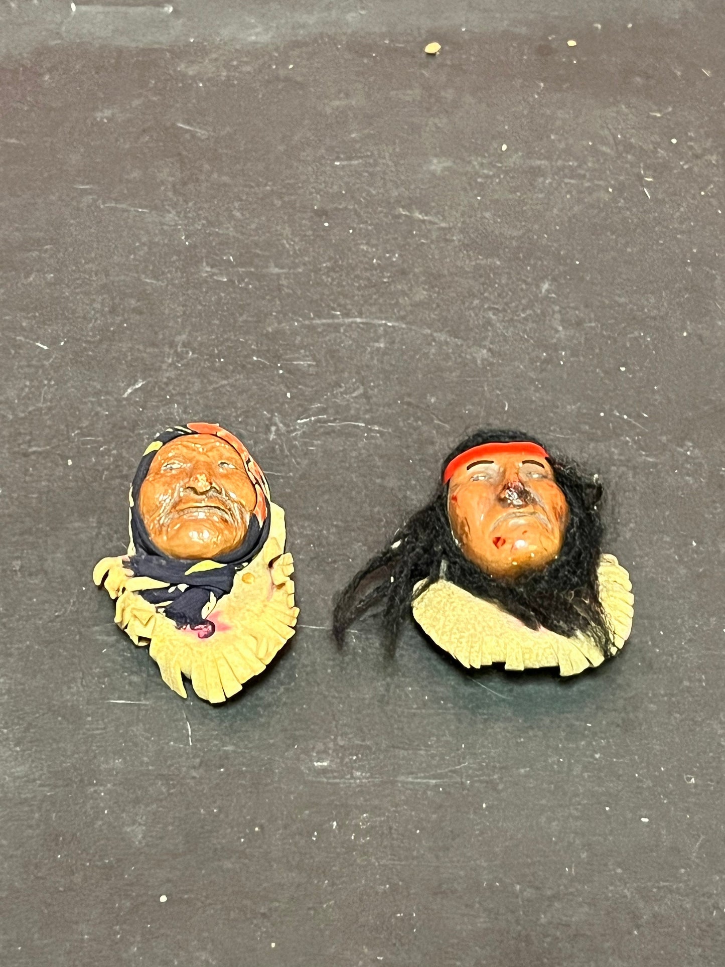 Lovely indigenous first nations pair of decorative heads  celebrating chief Seattle and his daughter  3 inches each