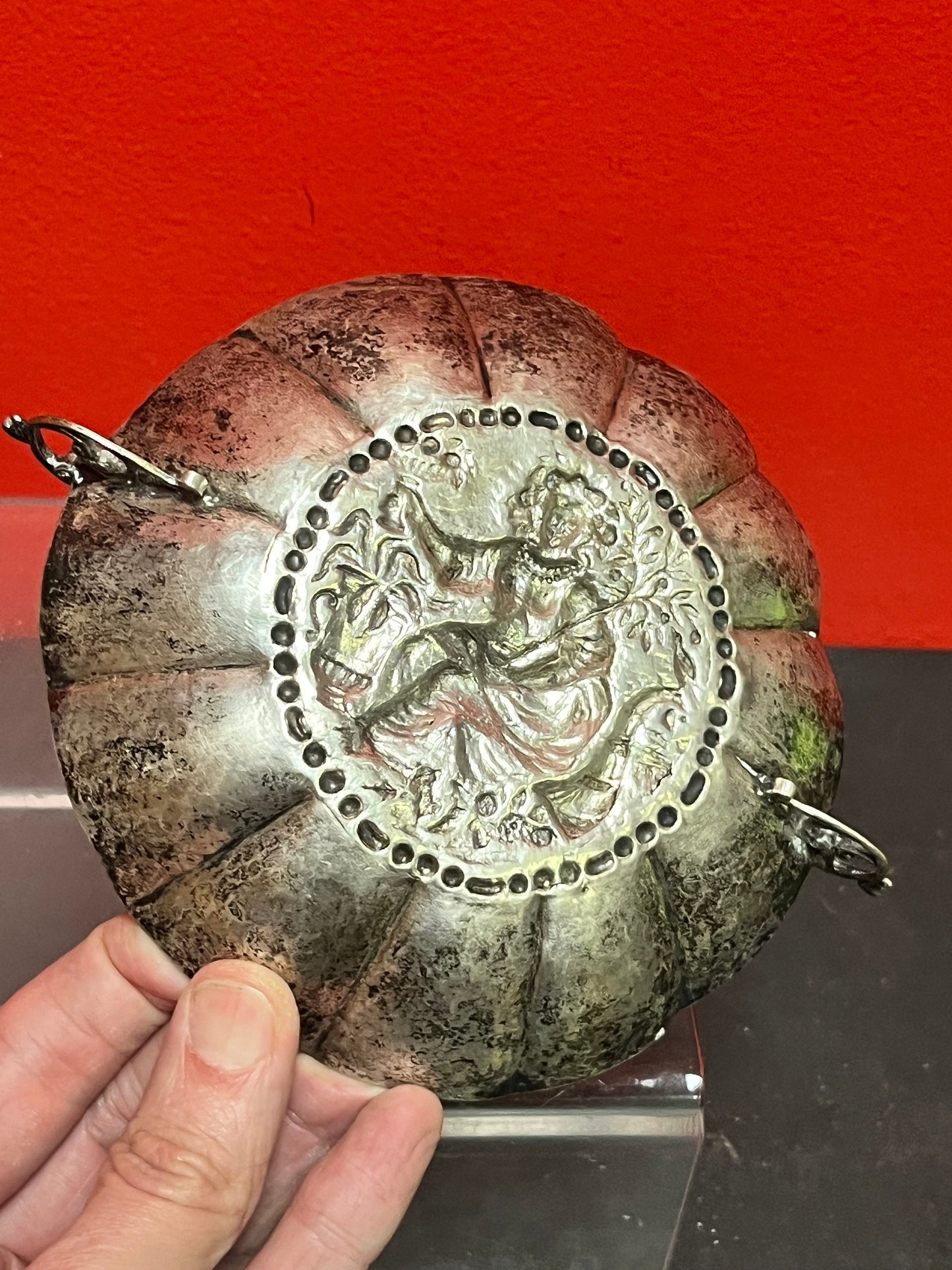 A  Persian silver bowl   7 inches and untested  great imagery and needs a polish