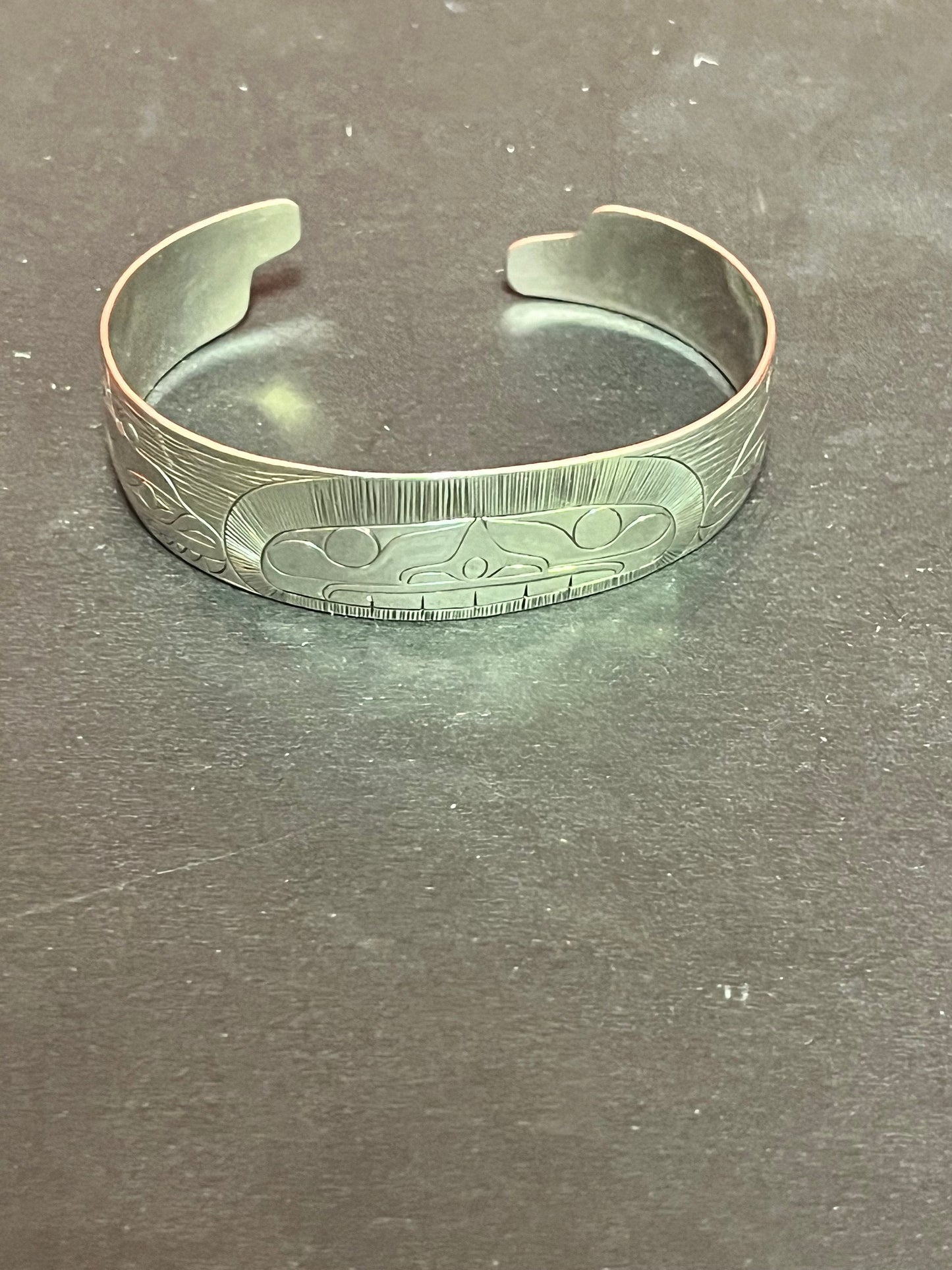 Lovely 2 1/2 inch wide heavy signed whale and sun indigenous first nations Pacific Northwest Coast Sterling bracelet bangle