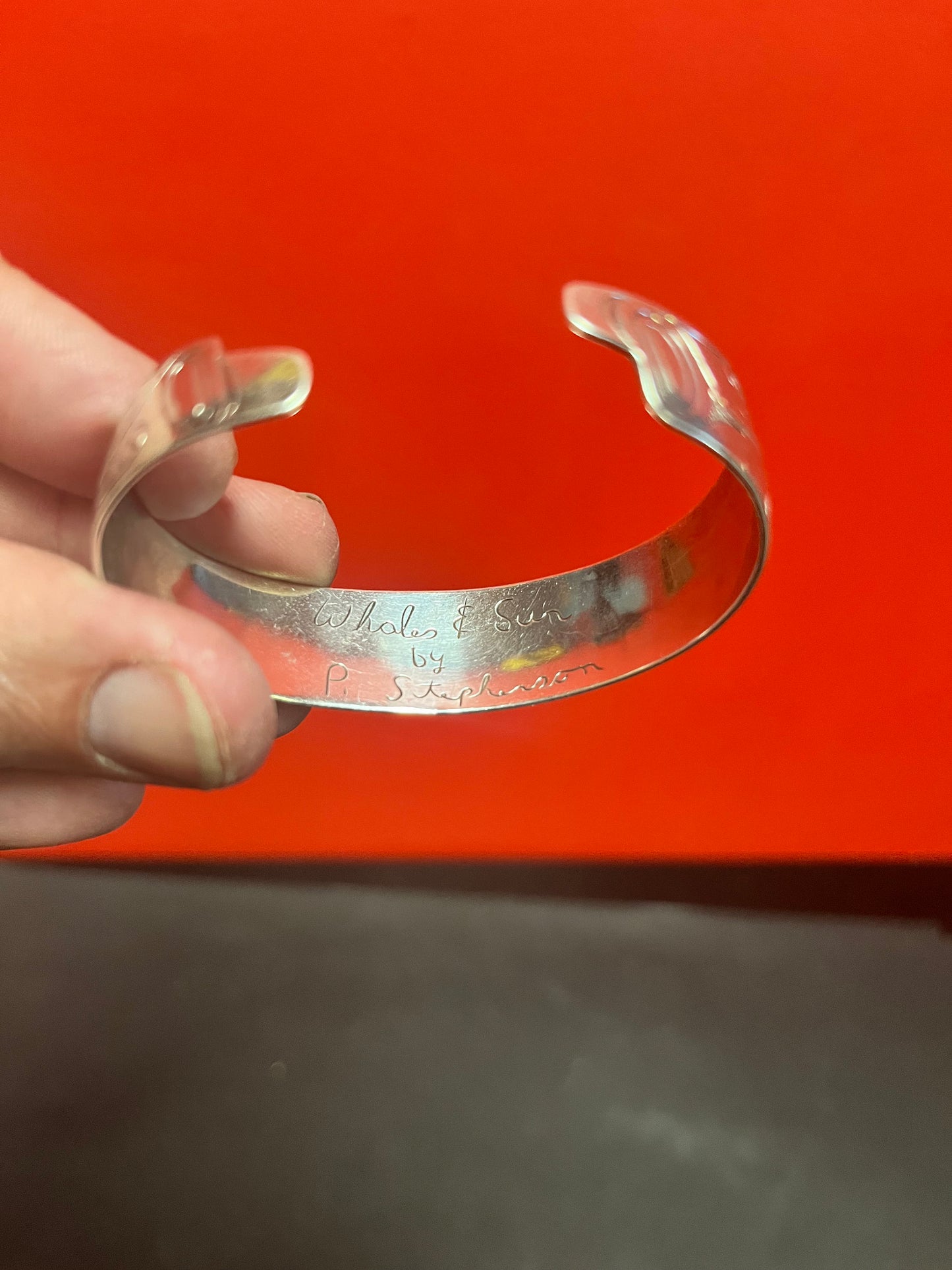 Lovely 2 1/2 inch wide heavy signed whale and sun indigenous first nations Pacific Northwest Coast Sterling bracelet bangle