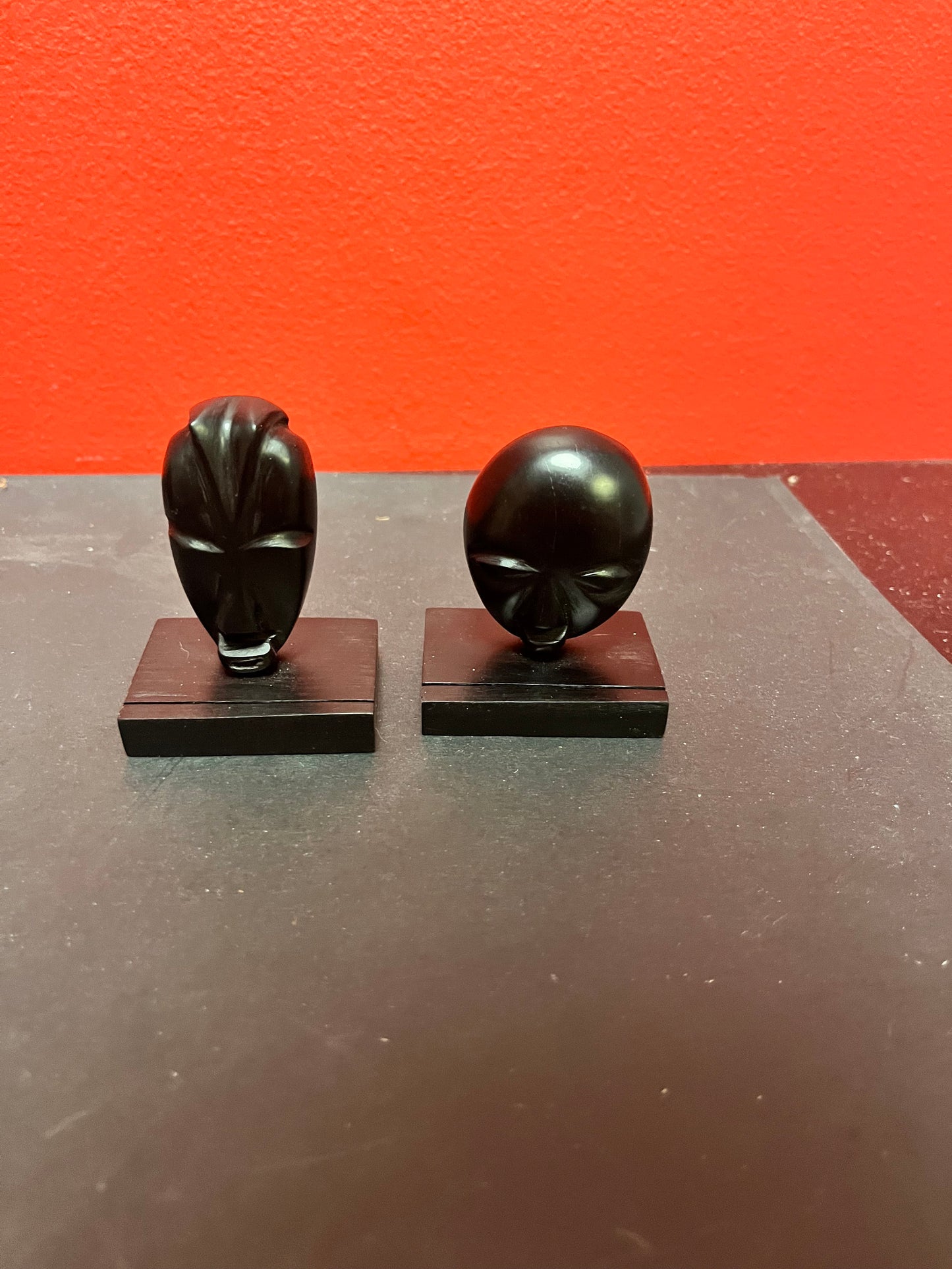 Two fabulous Ebony wood  African masks on stands  3 inches high  great quality and detail  prices for both