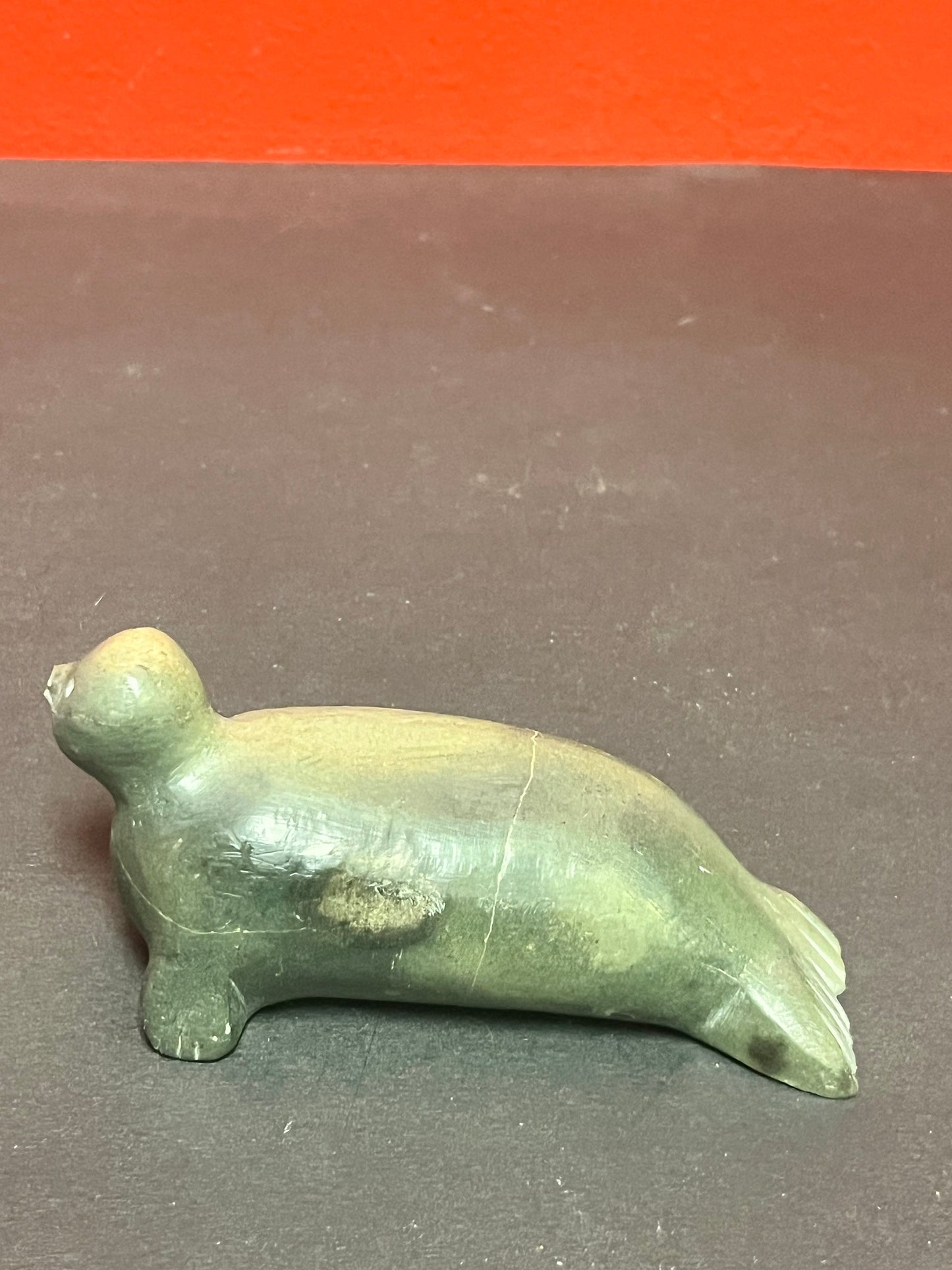 Lovely 5 inch indigenous Inuit soapstone signed seal statue