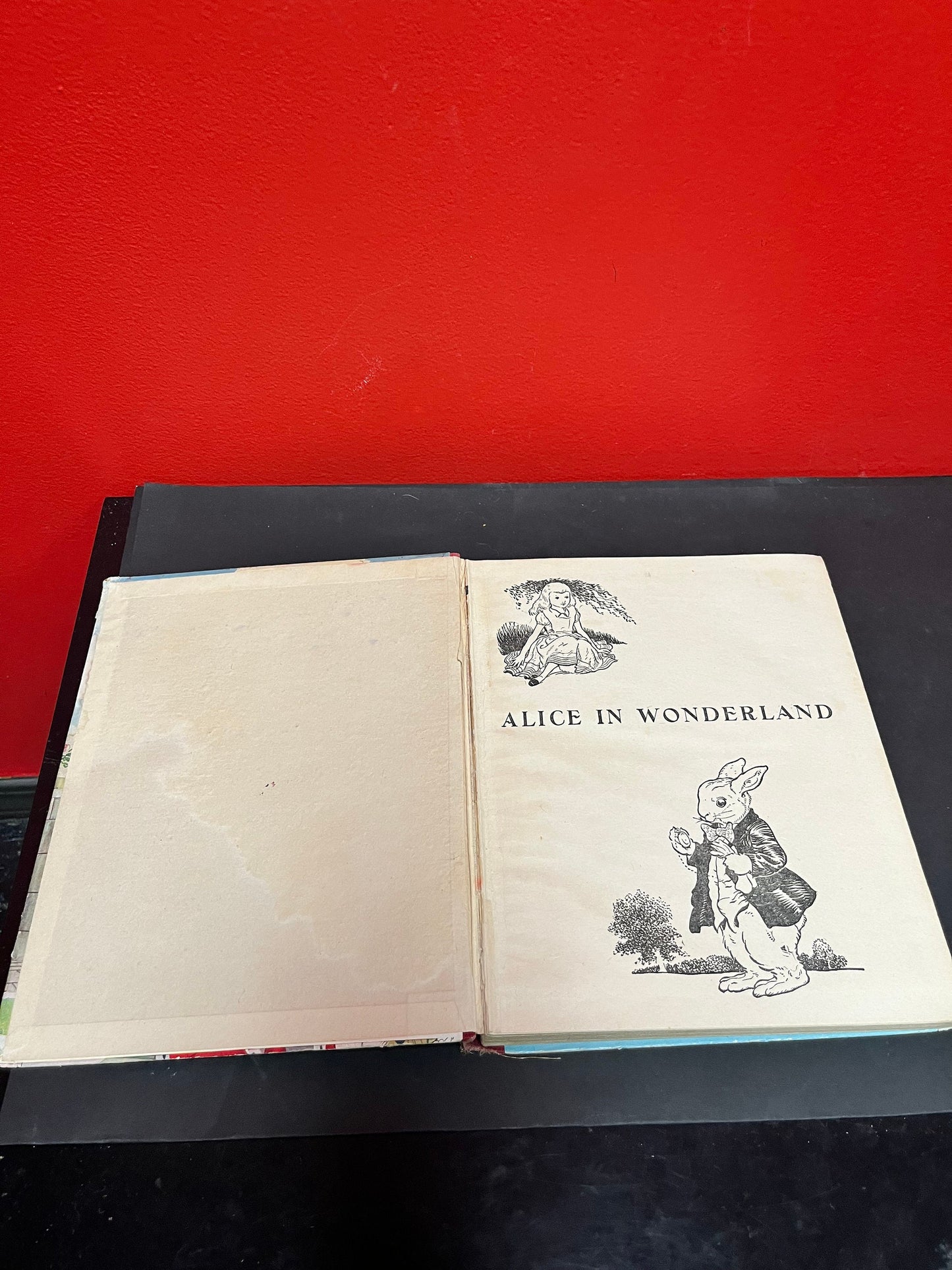 Antique 10 x 8 Alice in Wonderland book by Lewis Carroll  as is  see photos