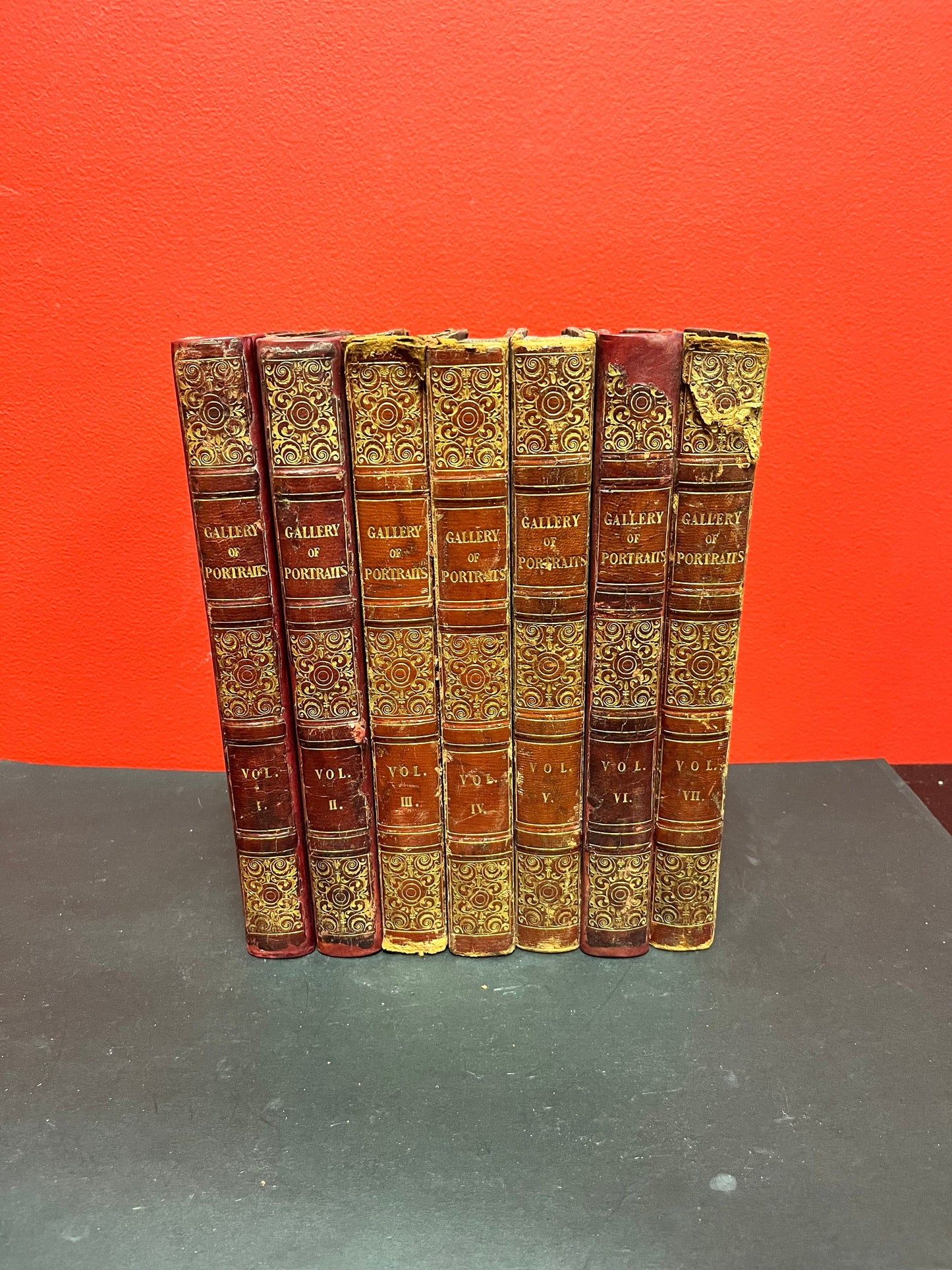 A  Stunning set of seven leather bound  1833 - 1837 Gallery of portraits books  good antique condition printed by William CLOWES  wow set