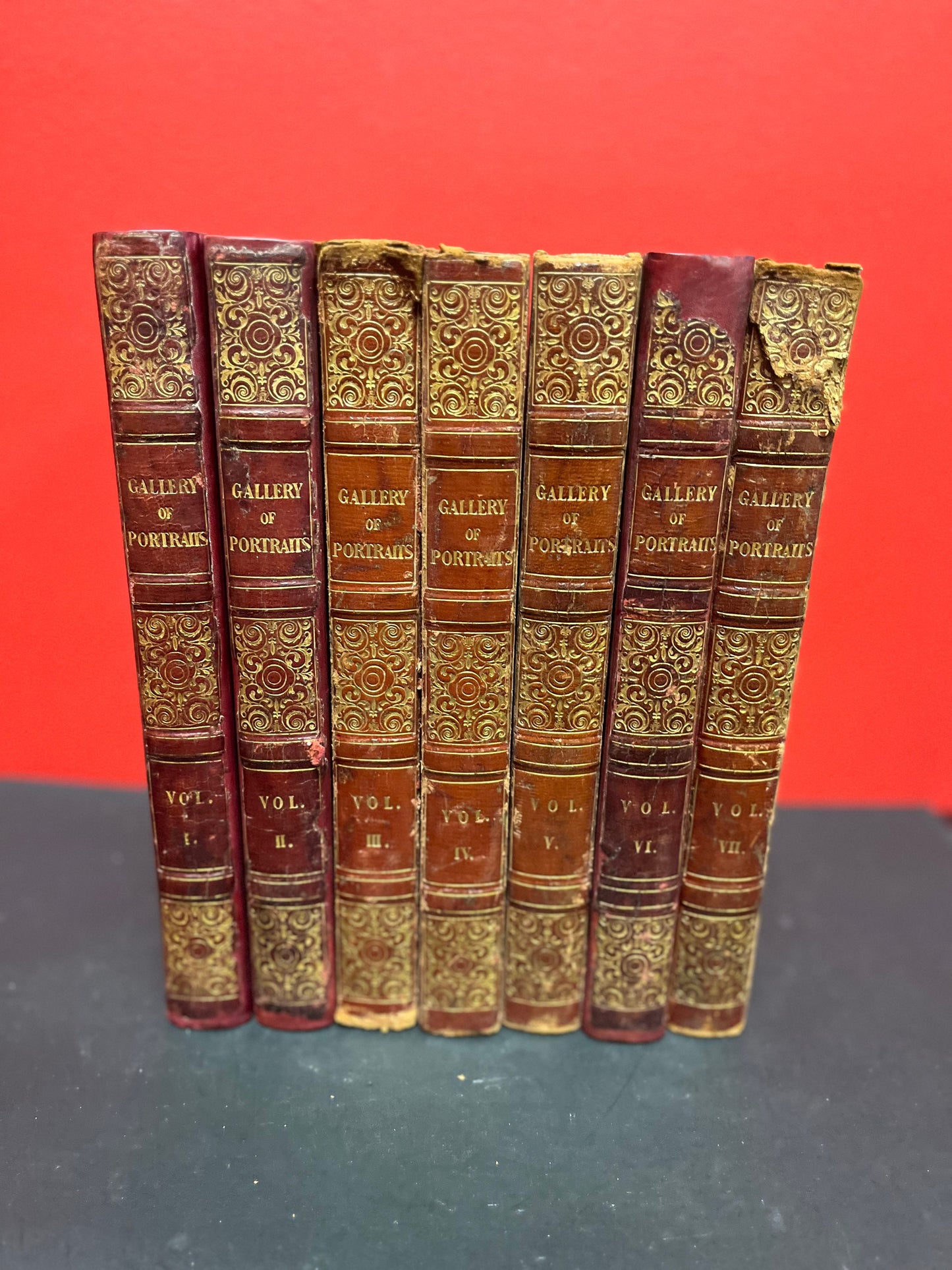 A  Stunning set of seven leather bound  1833 - 1837 Gallery of portraits books  good antique condition printed by William CLOWES  wow set