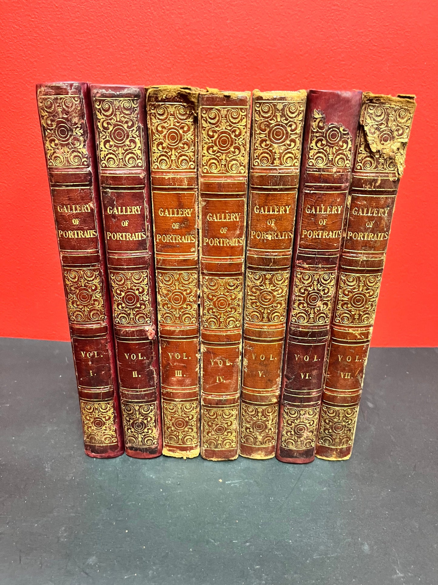 A  Stunning set of seven leather bound  1833 - 1837 Gallery of portraits books  good antique condition printed by William CLOWES  wow set