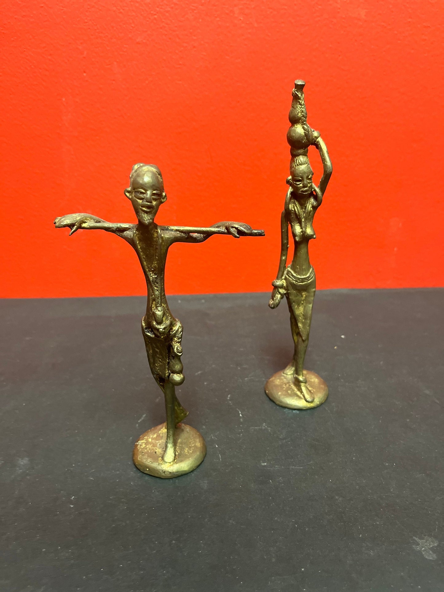 Two lovely old African Ashanti bronze statues   great patina and wonderful detail seven and 8 inches tall