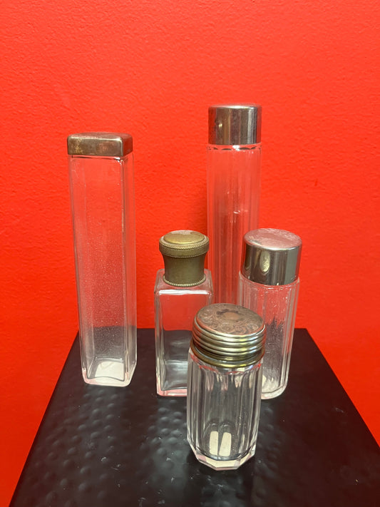 Lovely collection of five silver plated topped glass bottles  All English and all good condition  3 to 7 inches