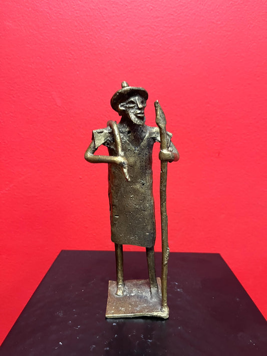 Lovely 7 inch tall African bronze  Benin statue of a farmer -