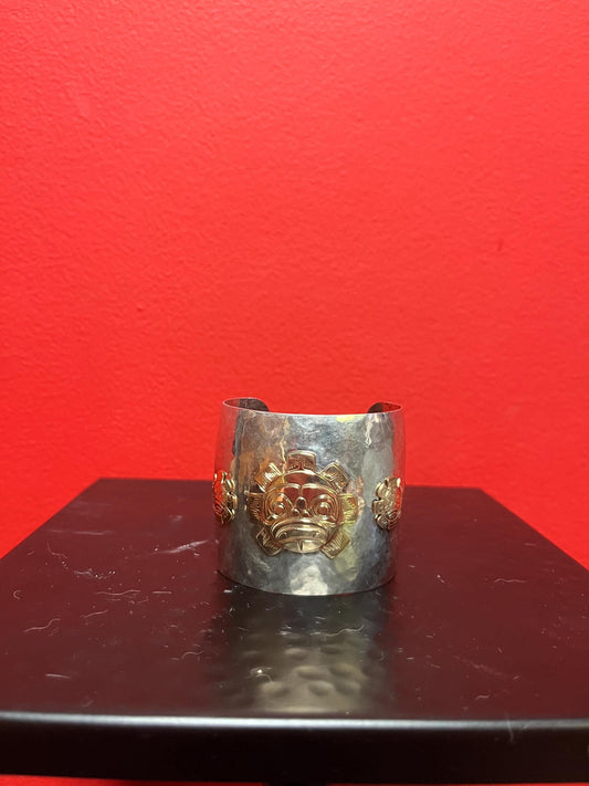 Magnificent signed heavy sterling and gold sun mask cuff  indigenous First NationsNorthwest Coast 2 1/4  wide and 2 high, 7 circumference