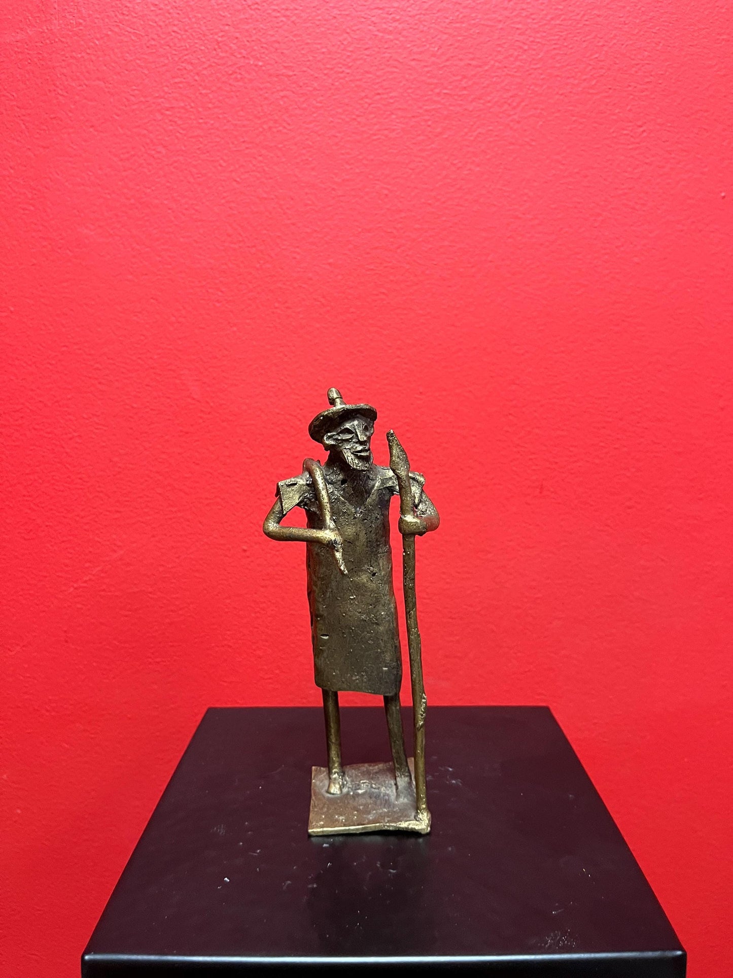 Lovely 7 inch tall African bronze  Benin statue of a farmer -