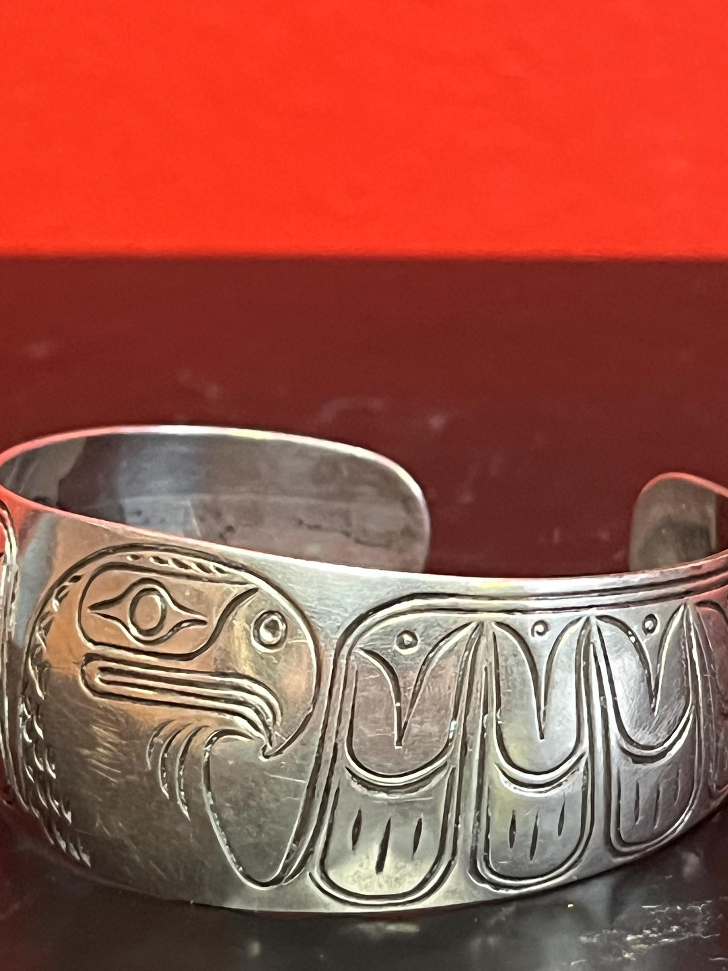 Lovely 2 inch  wide indigenous first nations sterling silver eagle bracelet   great gift and signed  heavy weight  amazing definition -