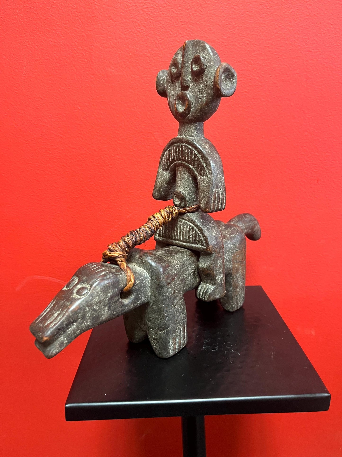 Rare beautiful African 10 x 10 inch antique statue of a man riding an animal  great patina and unusual imagery