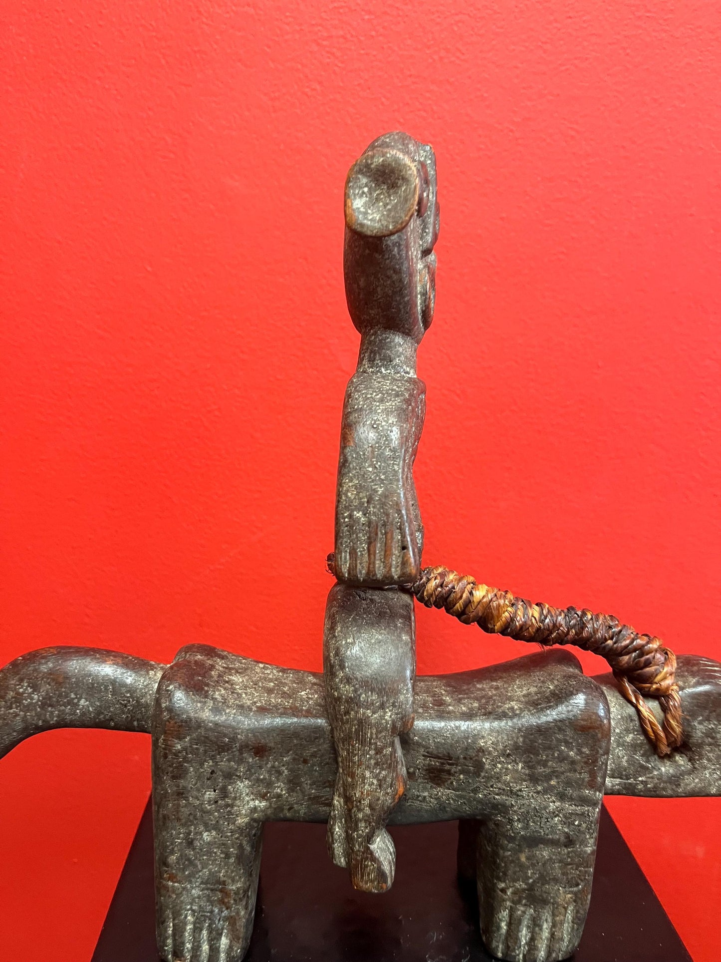 Rare beautiful African 10 x 10 inch antique statue of a man riding an animal  great patina and unusual imagery