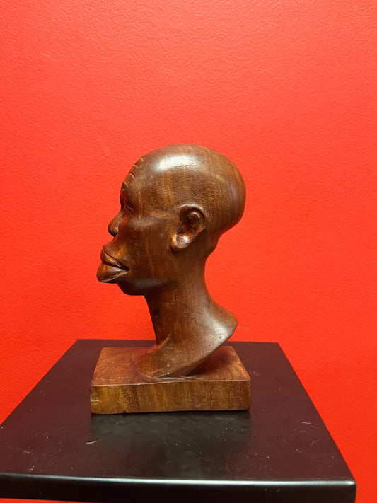 Beautiful 7 inch tall wonderfully carved statue of an African mans head  simple and elegant