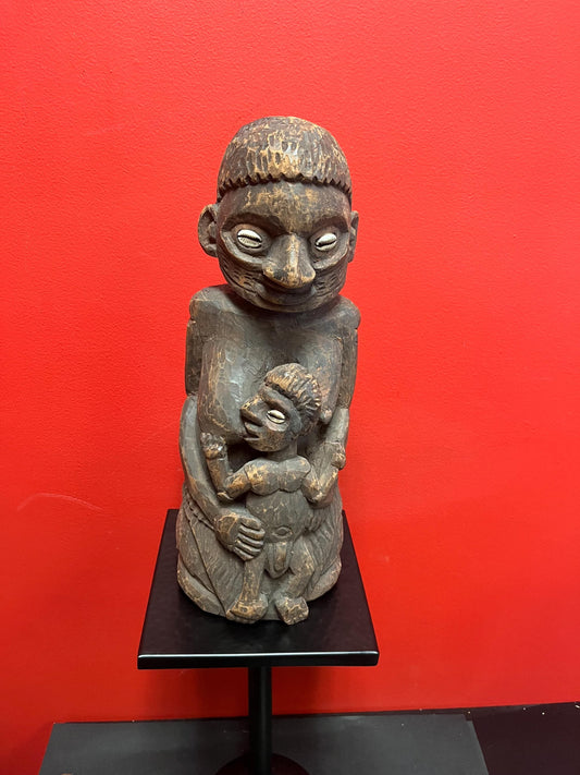 Super West African 16 inch wood statue of a mother feeding her son   shell eyes  amazing patina and imagery antique heavy African beauty