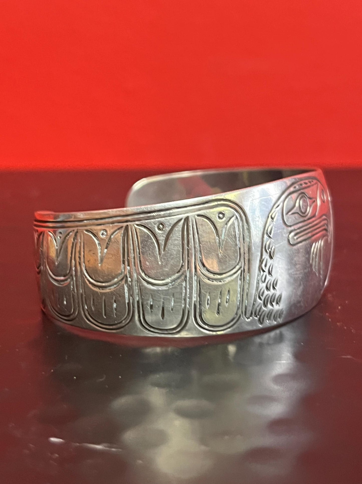 Lovely 2 inch  wide indigenous first nations sterling silver eagle bracelet   great gift and signed  heavy weight  amazing definition -