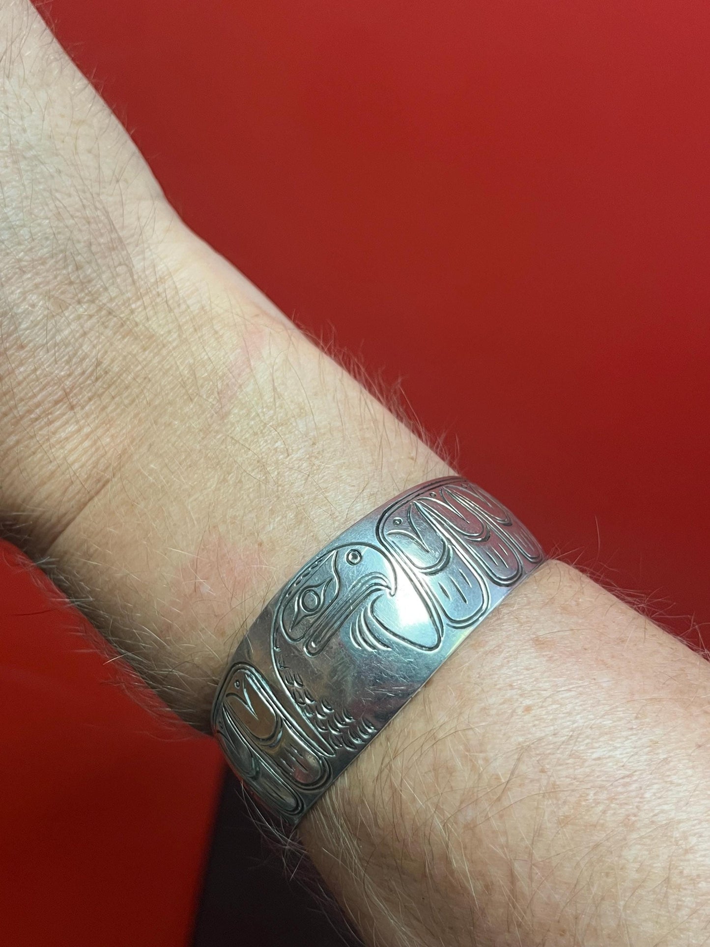 Lovely 2 inch  wide indigenous first nations sterling silver eagle bracelet   great gift and signed  heavy weight  amazing definition -