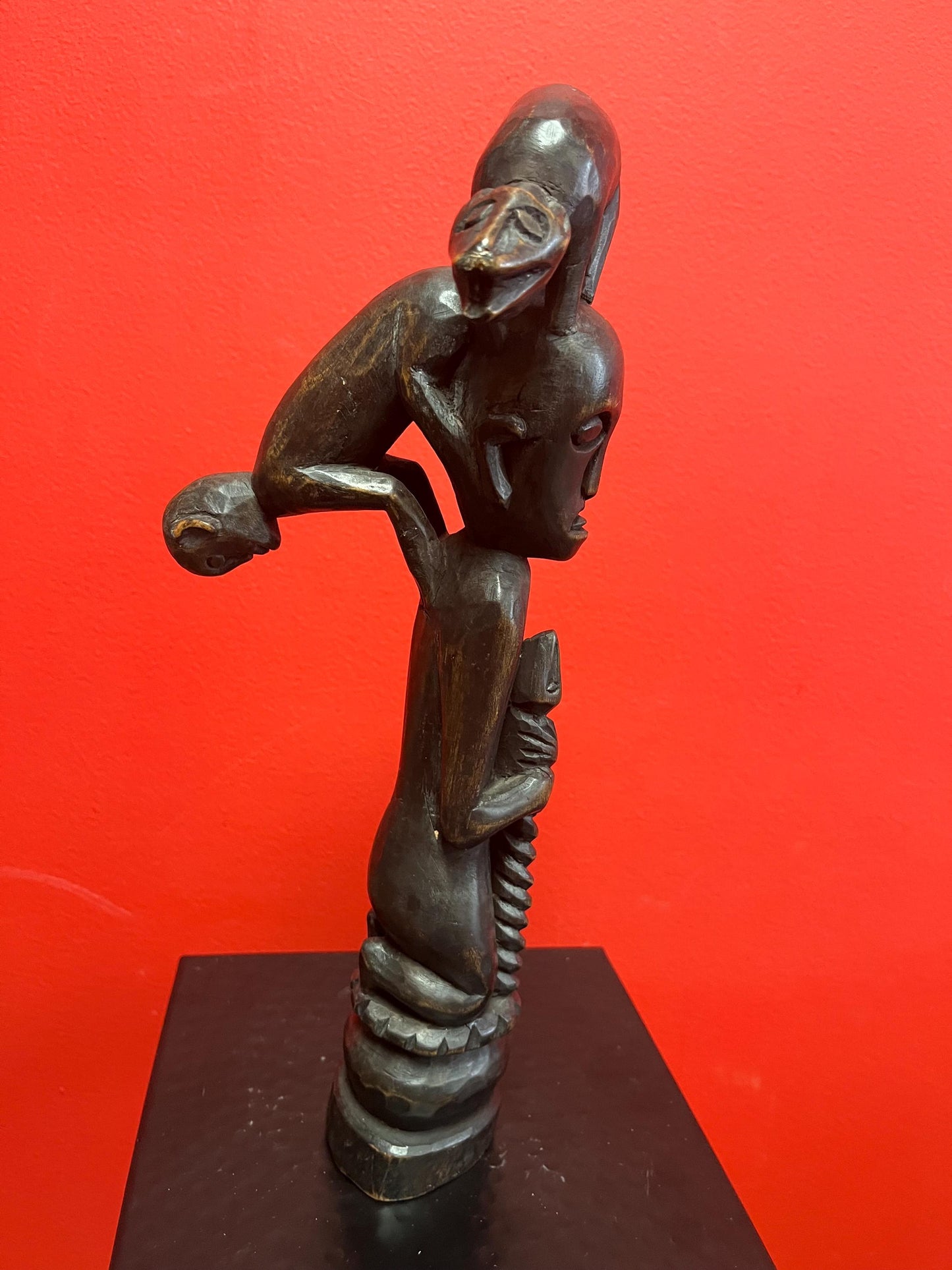 Beautiful Unusual African antique 12.5 inch tall statue of a man with a snake and monkeys climbing on him   stunning imagery wow