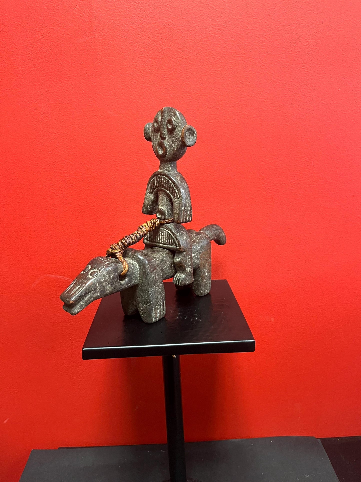 Rare beautiful African 10 x 10 inch antique statue of a man riding an animal  great patina and unusual imagery