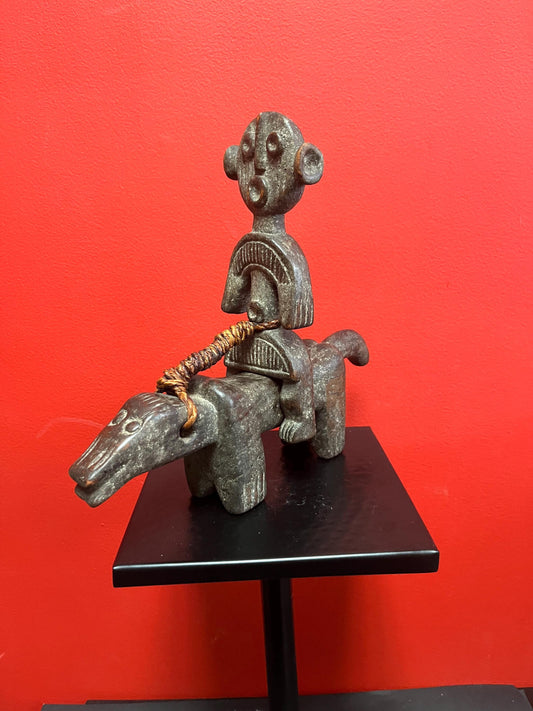 Rare beautiful African 10 x 10 inch antique statue of a man riding an animal  great patina and unusual imagery