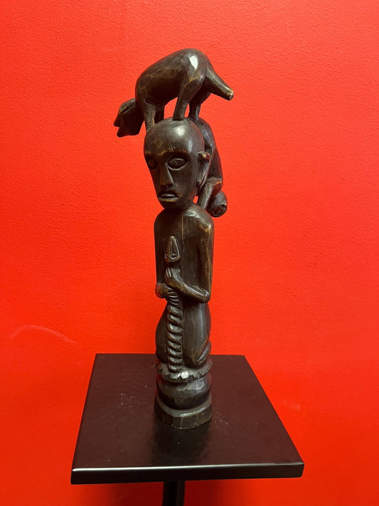 Beautiful Unusual African antique 12.5 inch tall statue of a man with a snake and monkeys climbing on him   stunning imagery wow