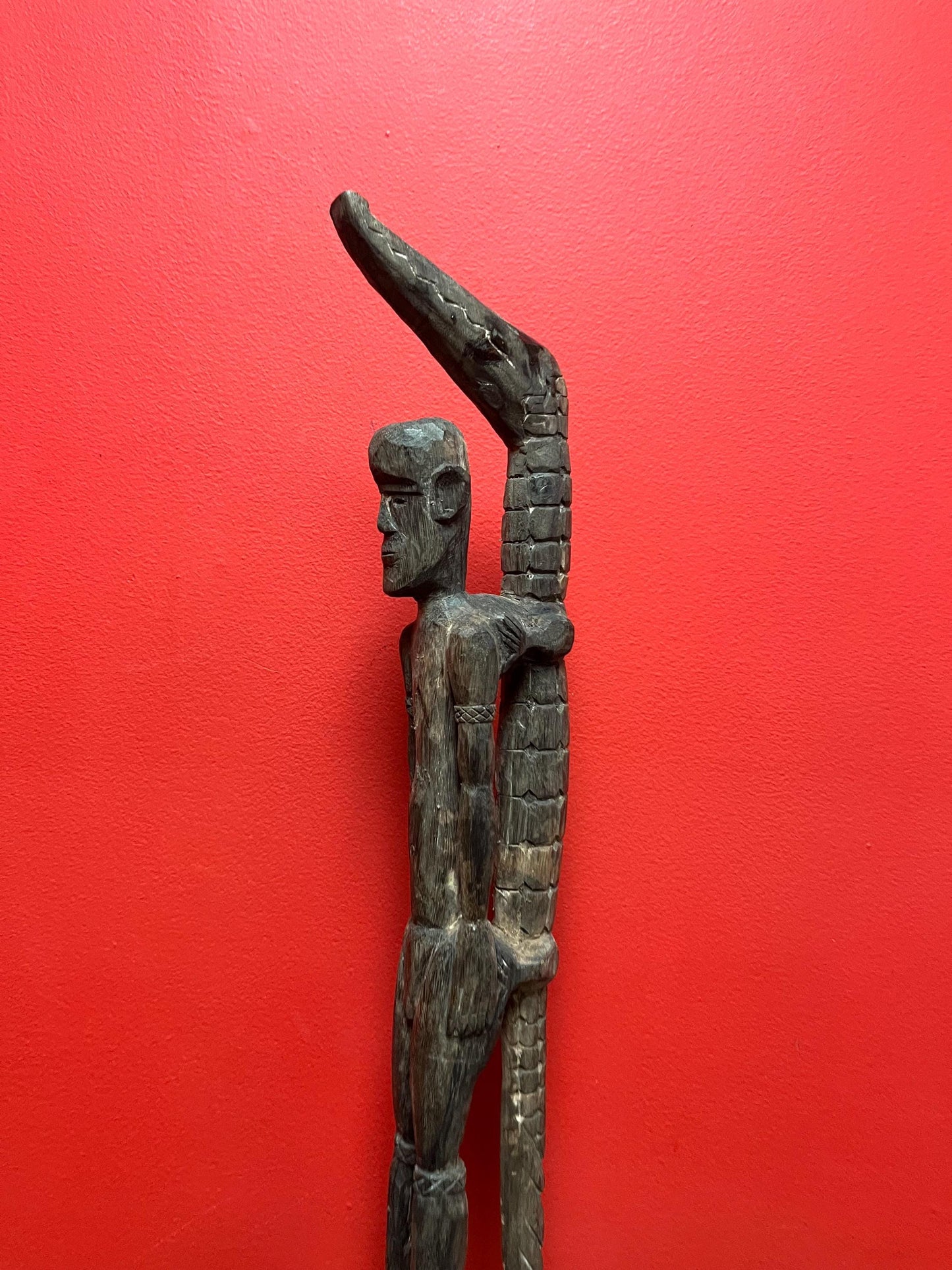 Antique 22 inch long African statue of a man with a crocodile  primitive beauty with great detail and fabulous patina  good value