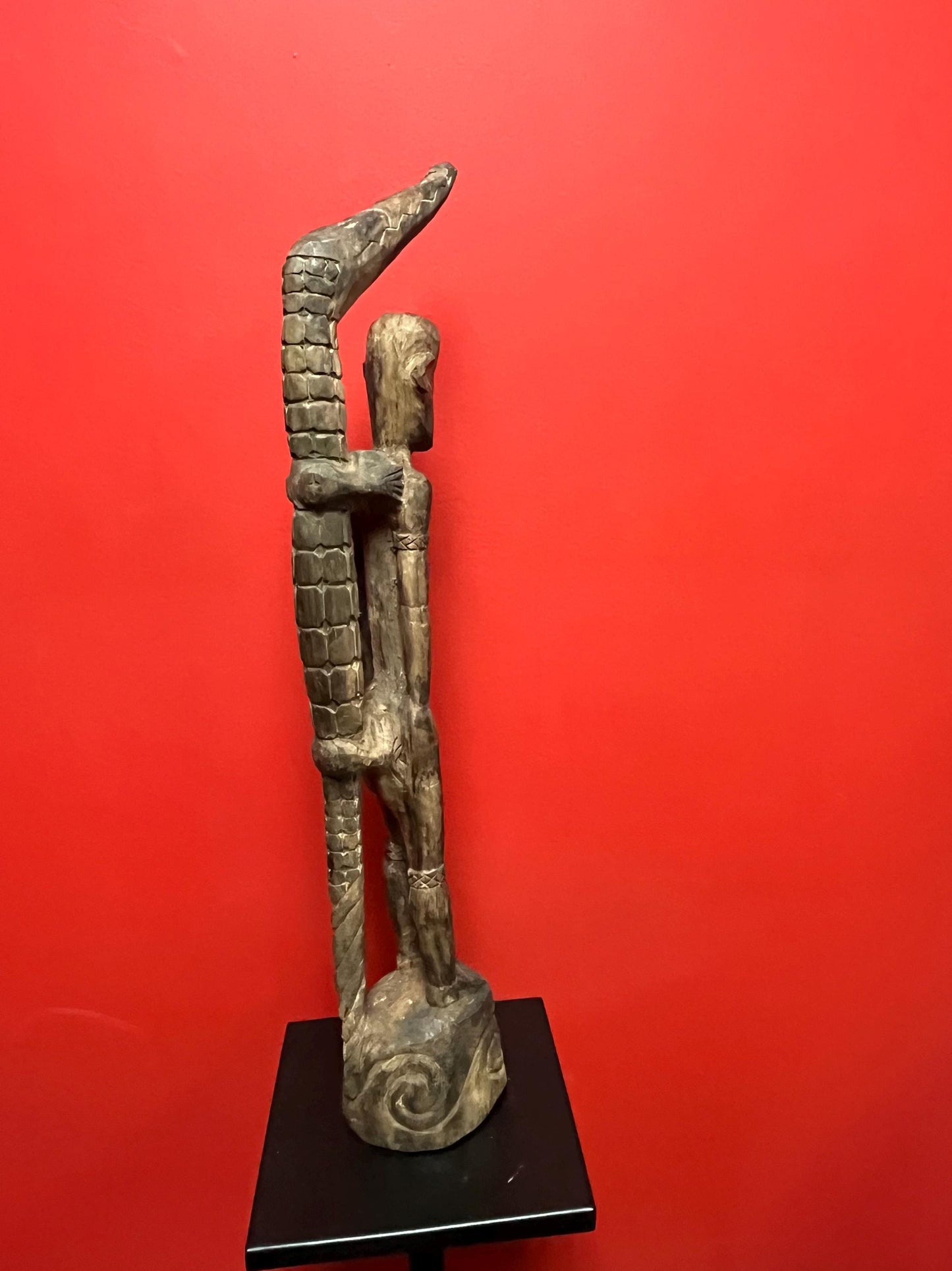 Antique 22 inch long African statue of a man with a crocodile  primitive beauty with great detail and fabulous patina  good value