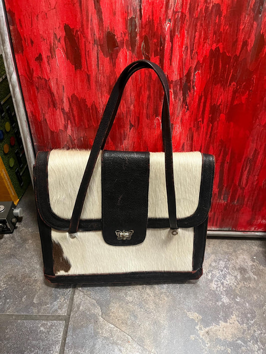 17 x 12 x 3 thick fabulous vintage cowhide and leather handbag with butterfly latch  great condition for age  great to use or gift  wow