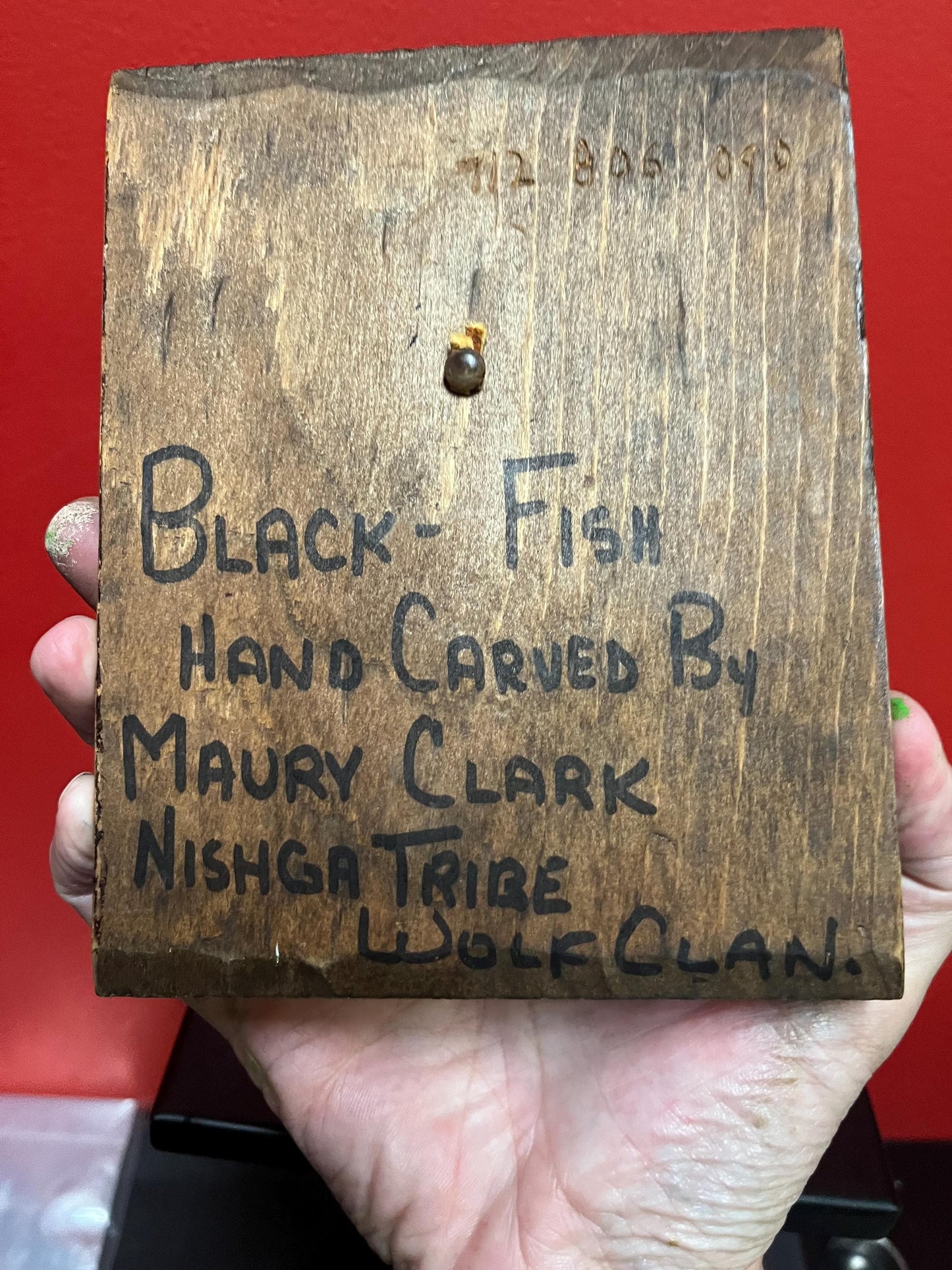 Lovely signed black fish by MAURY CLARK indigenous first nation specific northwest coast  cedar  needs hanger  7 x 5