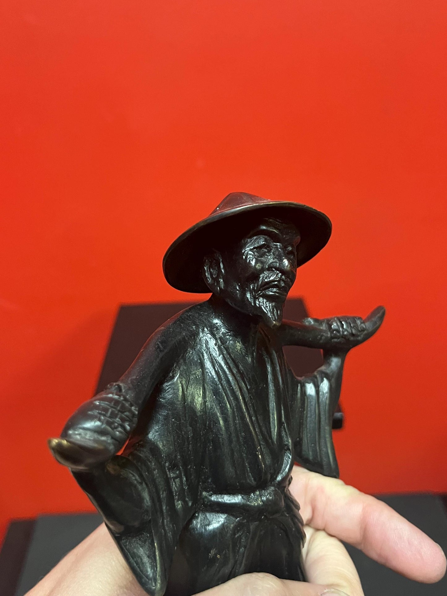 9.5 x 6 inch wide Chinese bronze statue of a man  lovely patina  and great quality  good condition and great value  heavy