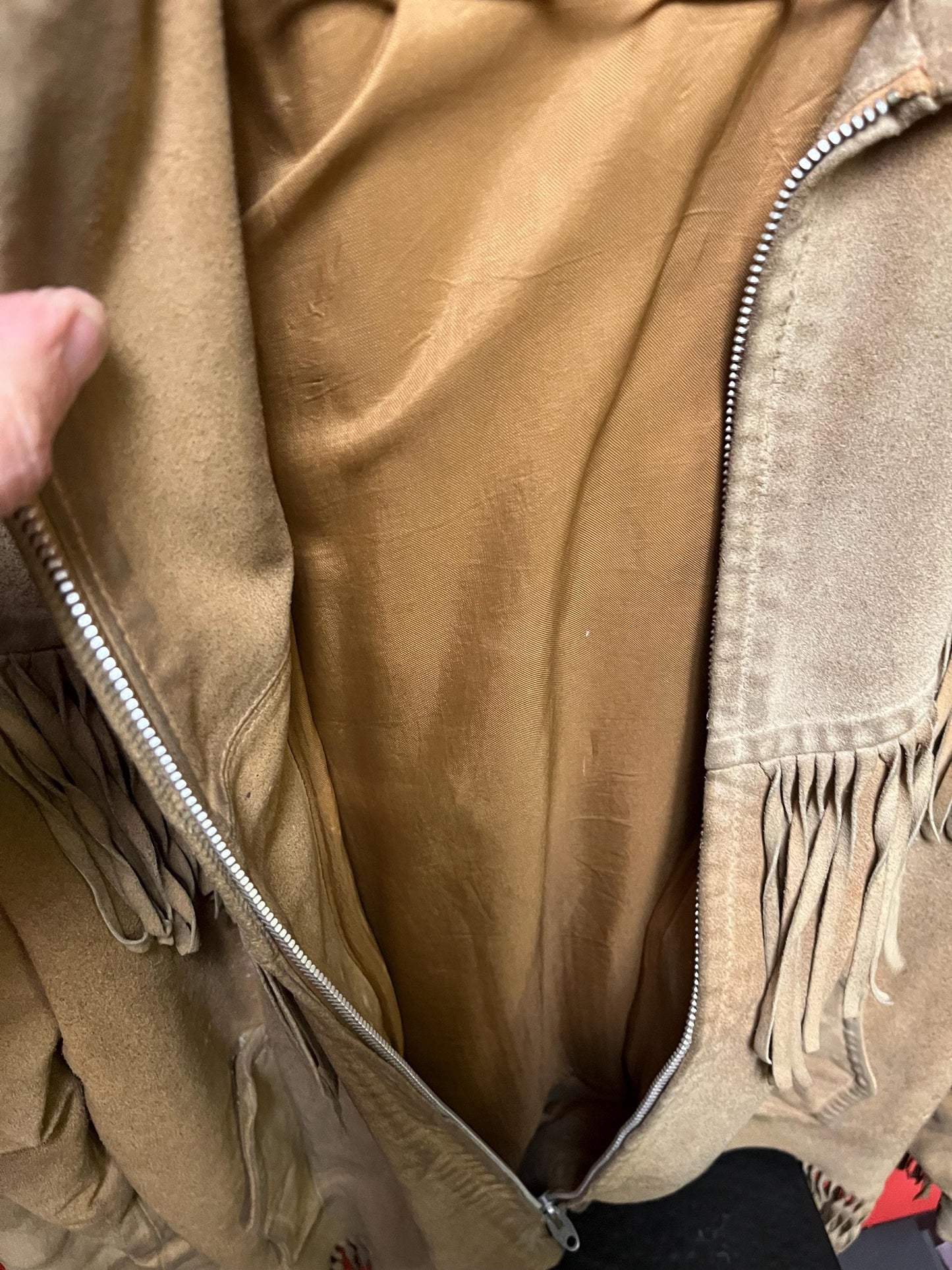 Vintage 33 inch long by 14 inch chest cowhide Cherokee style jacket with tassels  very cool and ready to wear