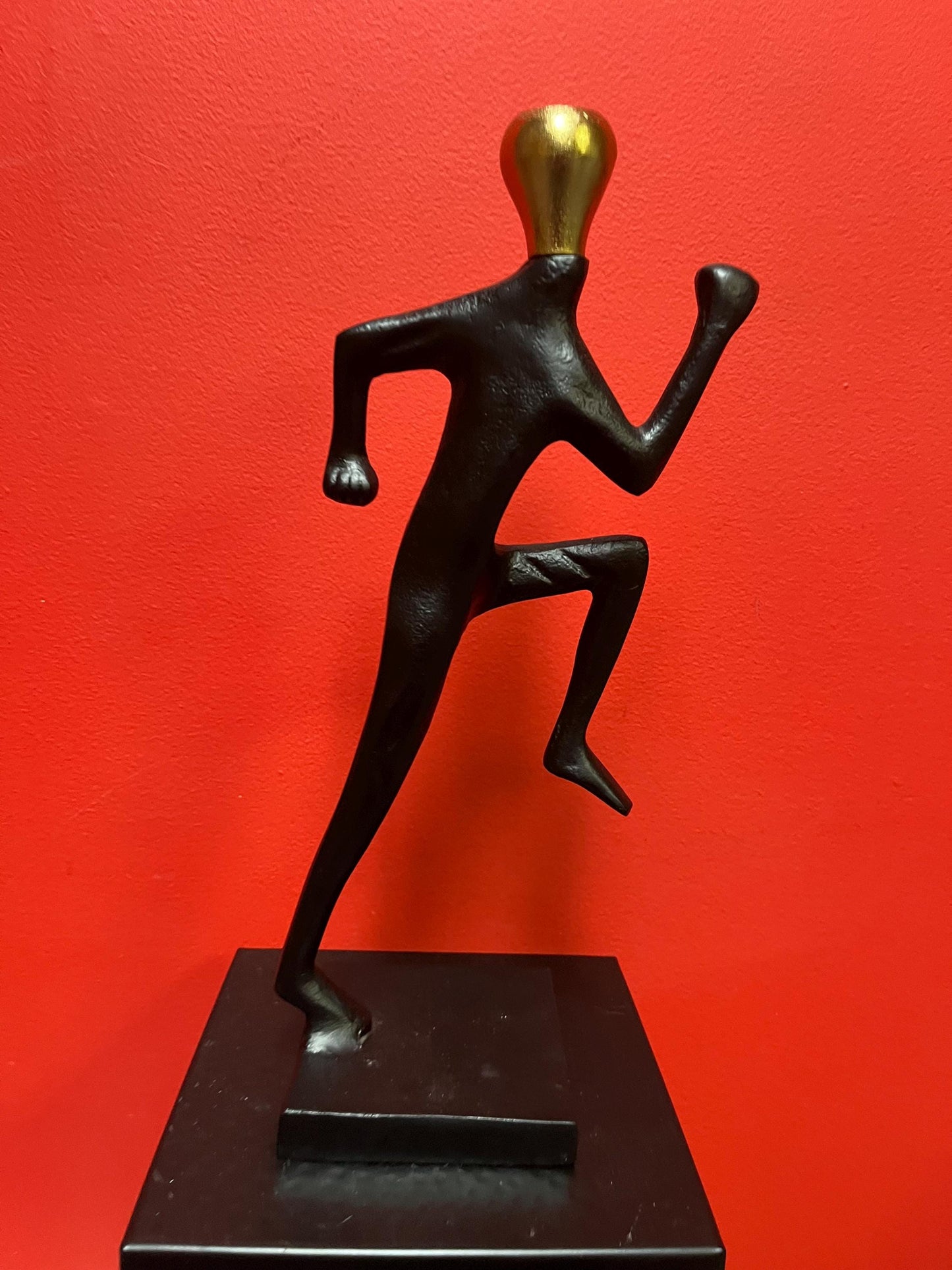 Stunning 14 inch tall cast metal running man candlestick  holder  impressive and unique - great gift for a runner