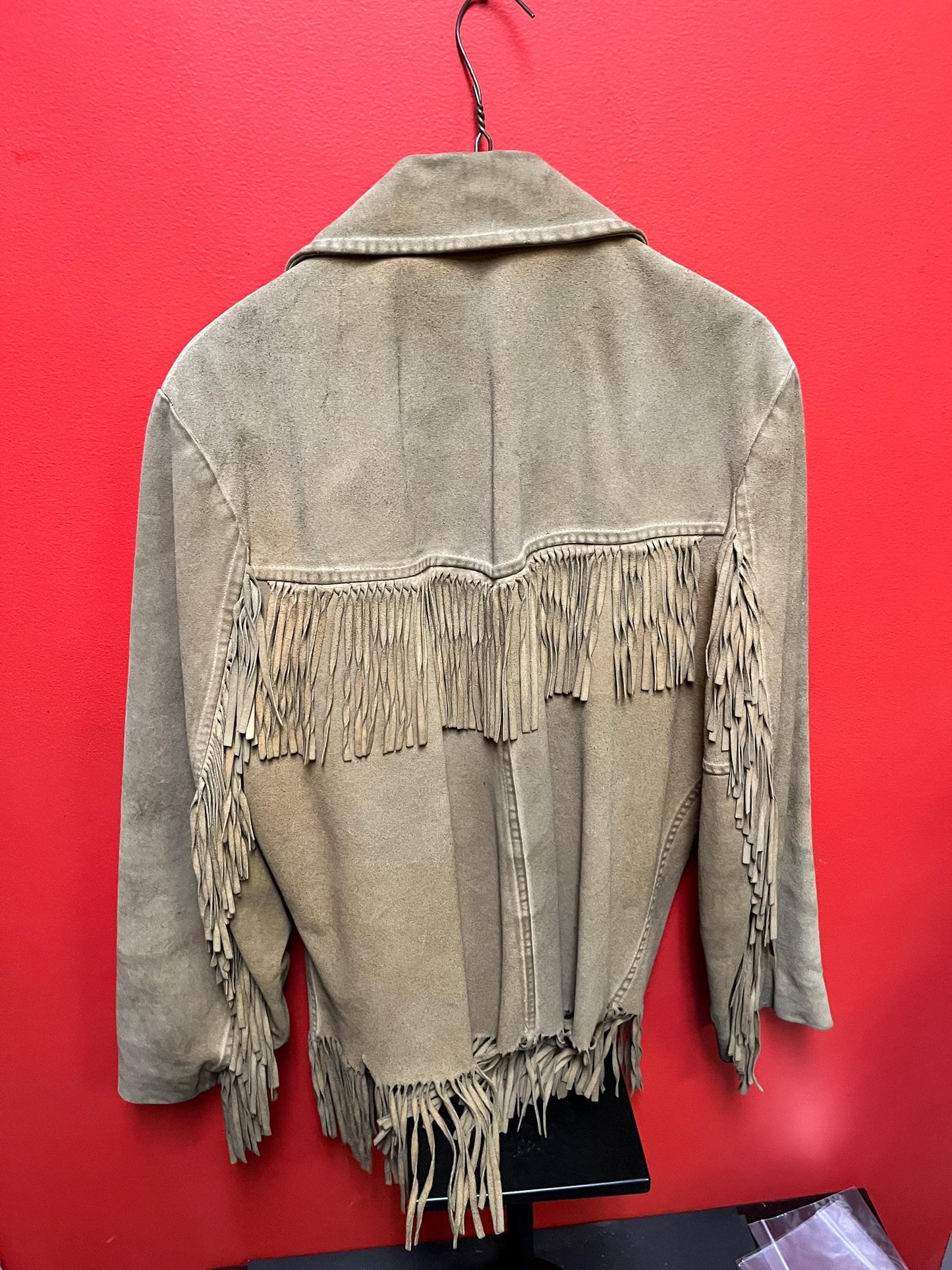 Vintage 33 inch long by 14 inch chest cowhide Cherokee style jacket with tassels  very cool and ready to wear