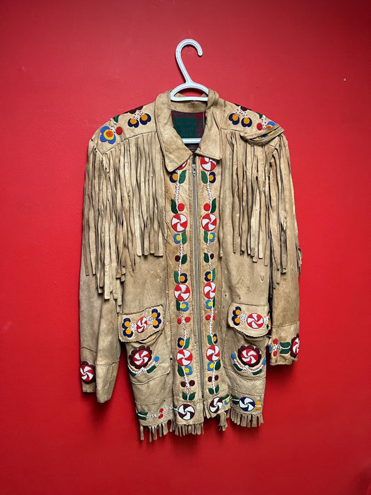 Stunning, indigenous native antique beaded jacket  approximately 32 inches long and 16 inch chest medium to large  minor damage see photo