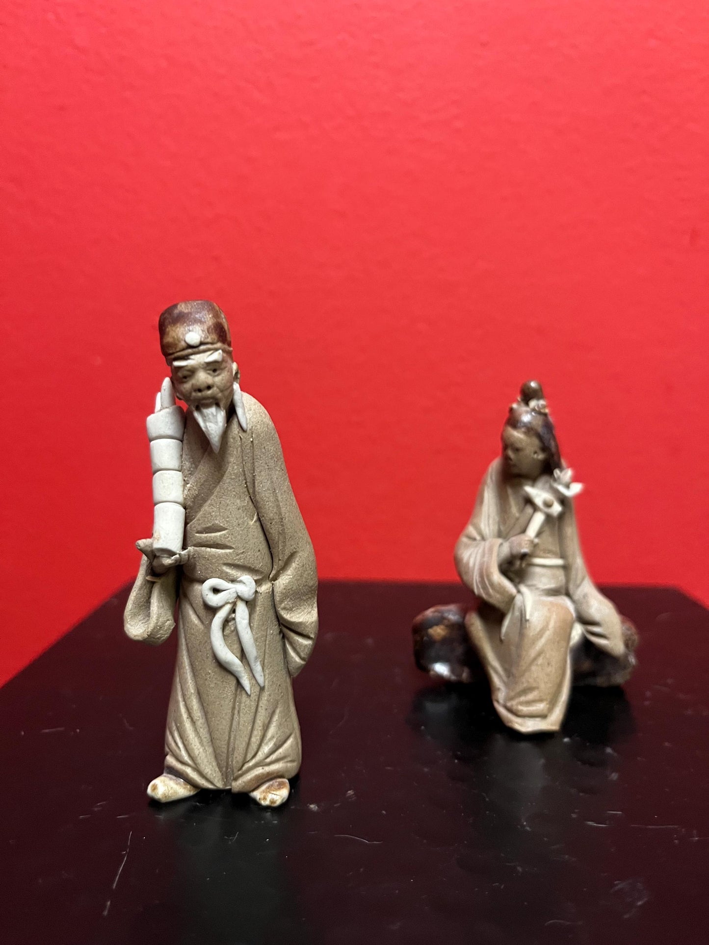 Pair vintage Chinese mud men   both approx 3 inches tall  good condition and good value