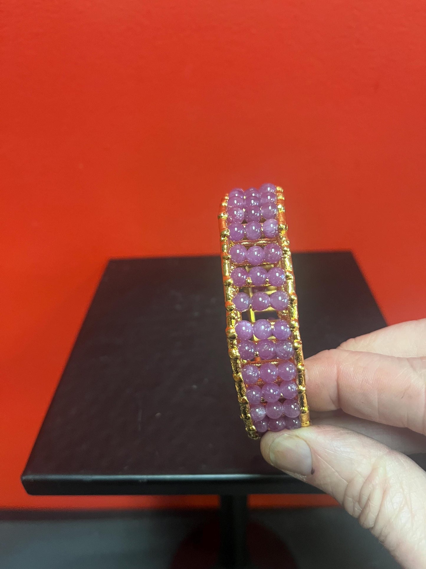 Magical Canadian made 4 inch wide gold plated and ruby bracelet by  award-winning artist Charles Lewton -Brain  cage series piece  wow